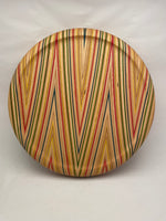 Beautiful and playful bar stool seat. made of skateboard wood layers. Top view.
Fits on most supports with round top structure.