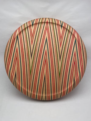 Beautiful and playful bar stool seat. made of skateboard wood layers. Top view.
Fits on most supports with round top structure.